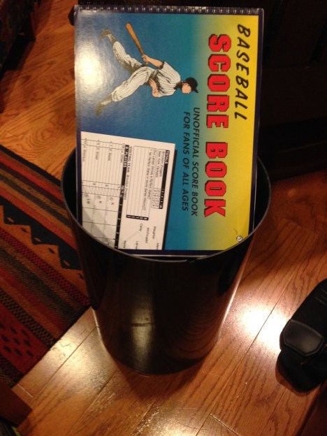 Score Book getting ready to go to the trash