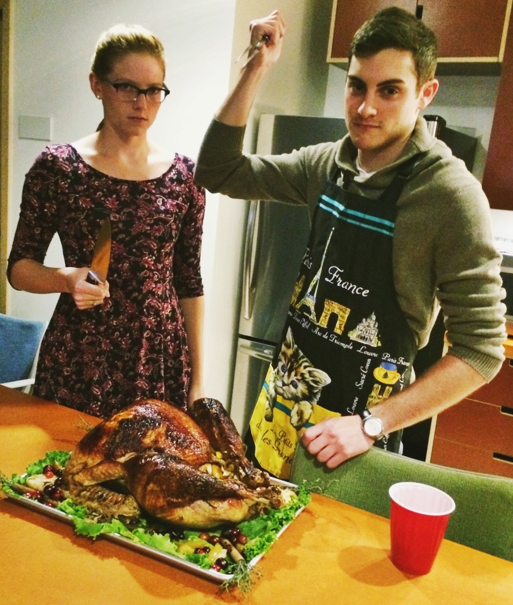 Claire and Jason prepare the turkey