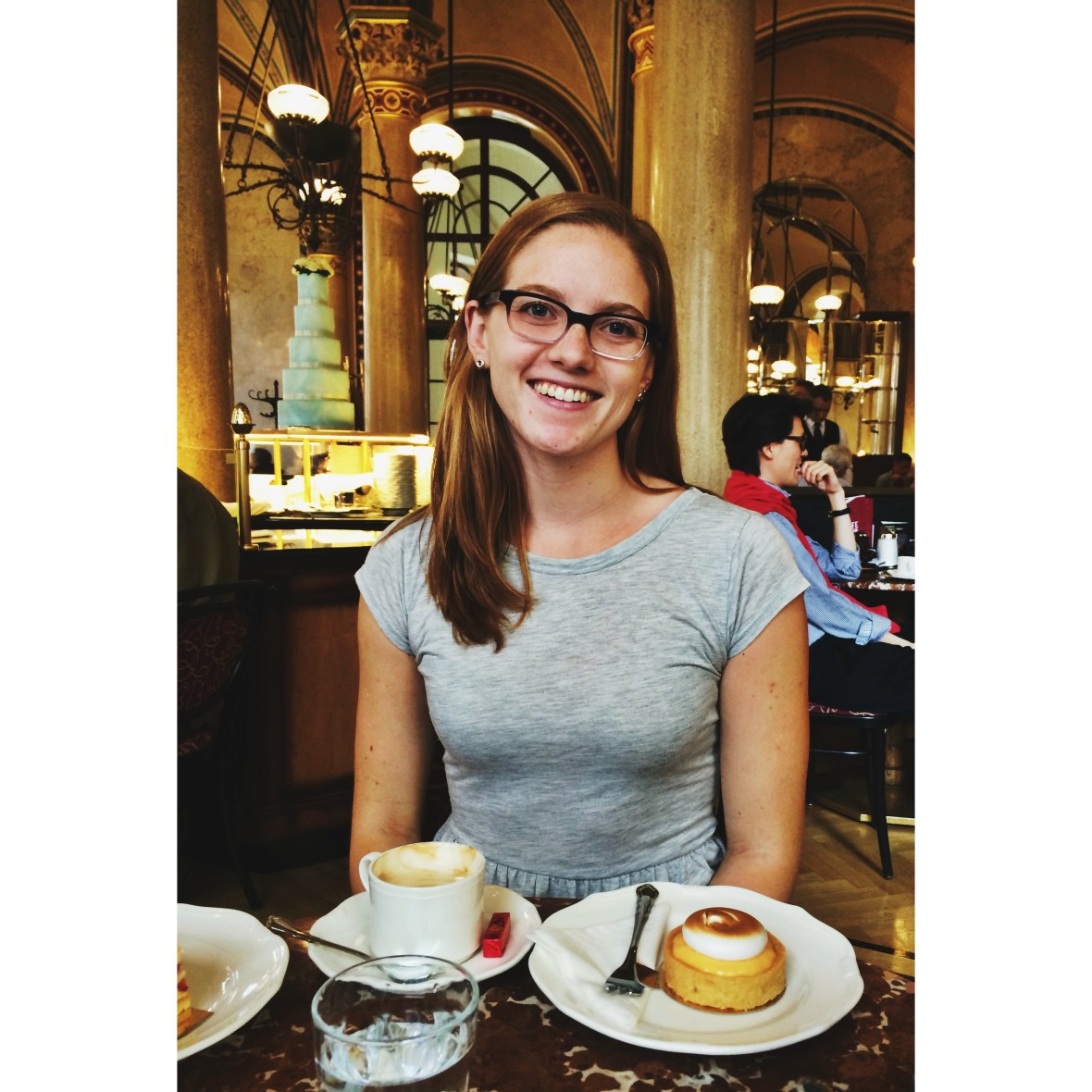 Claire living large in a Vienna cafe