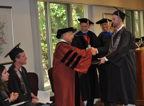 Receiving his diploma